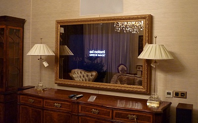 Телевизор в зеркальном багете